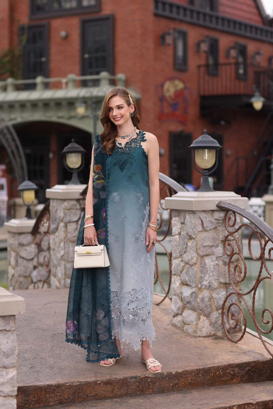 Model in a teal and grey ombre embroidered chiffon suit with cutwork daman.