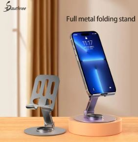 Sauthree full metal folding stand in silver with a smartphone mounted.