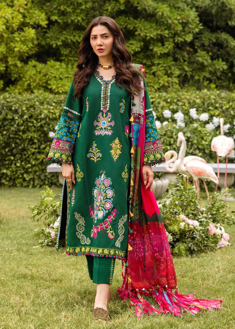 Luxury Eid collection embroidered green suit for women with tassel details.