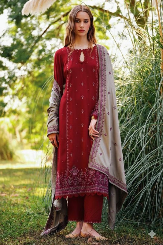 Maroon unstitched winter suit with floral embroidery and scalloped daman.