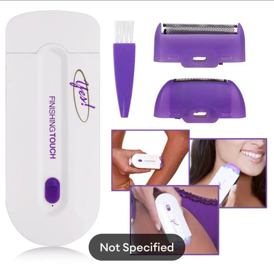 White Yes! Finishing Touch hair remover with purple accents and USB cable.
